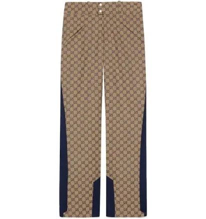 Gg Supreme Canvas Trousers In Brown