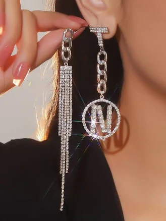 BABARONI Asymmetric Letter Tassel Earrings