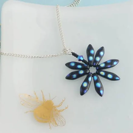 Sterling Silver Daisy Pendant Necklace with Blue Metallic Spots