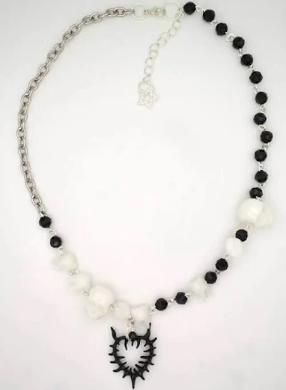 Spiky Heart Necklace with Teeth, Skulls, and Spiky Heart