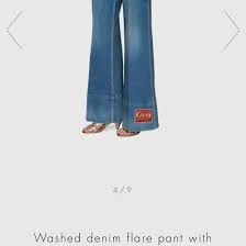 Washed denim flare pant with Gucci label