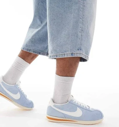 Nike Cortez suede sneakers in light blue and white