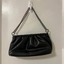medium plea bag in black from korean brand...