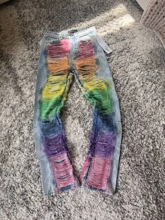 Who Decides War by MRDR BRVDO ROYGBIV Distressed Signature Jeans Indigo