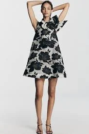 The Caroline Sleeveless Tie-Neck Mini Dress by Maeve