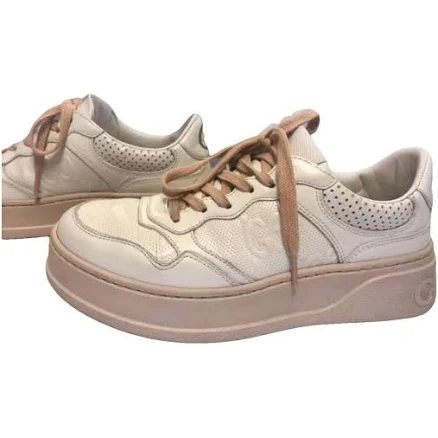 Gucci Women's GG Embossed Leather Low Top Sneakers