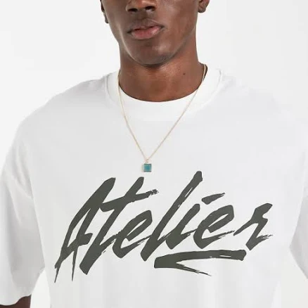ASOS DESIGN oversized T-shirt with Atelier graphic in white