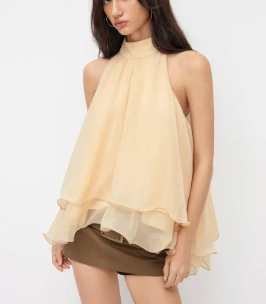 Halter Neckline Knotted Ruffle Hem Blouse